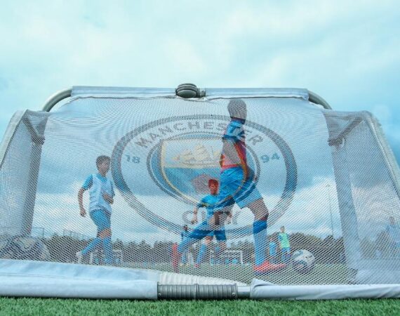 Manchester City FC Summer Camp Boys Training Behind Goal