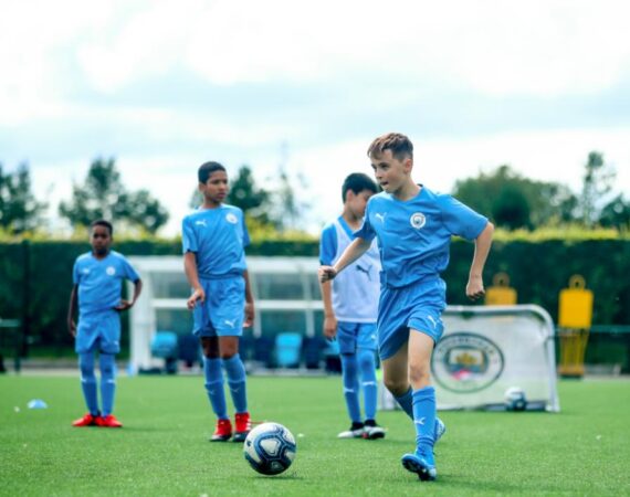 Manchester City FC Summer Camp Boys Training Four Boys