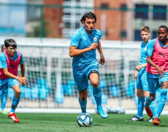 Manchester City FC Summer Camp Boys Training Three Boys