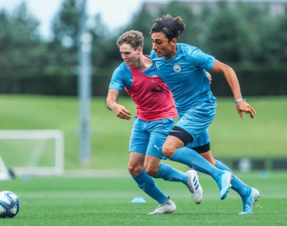 Manchester City FC Summer Camp Boys Training Two Boys